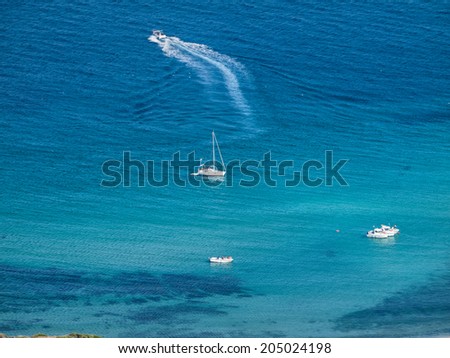 View from above to boats in the bay Cala Arenas of the strait of Gibraltar near Algeciras, Andalusia, Spain