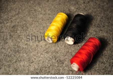 Three spool of thread