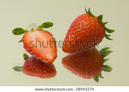 Strawberry studio isolated on reflective surface