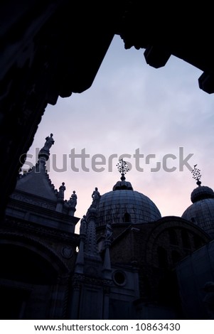 Doge\'s palace Exterior rooftop in Venice, Burning sky at the evening, dark blue-violet ambiance