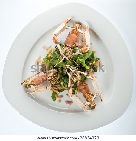 Scampi with bacon and rocket salad