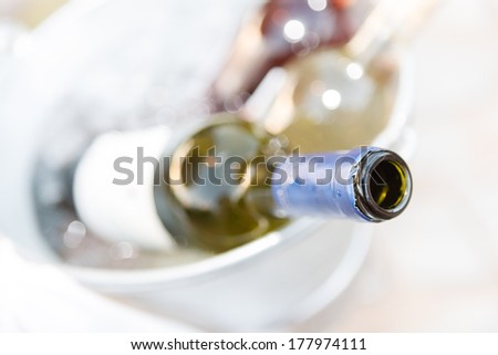 Close Up High Angle View Of The Open Neck Of A Bottle Of Wine In A Wine Cooler For Entertaining At A Special Event