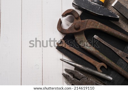 Construction tools. Pliers, hammer, chisel, screwdriver, wrench, and the core