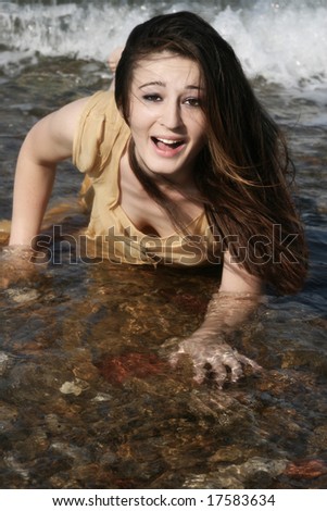 Woman wet by the sea water