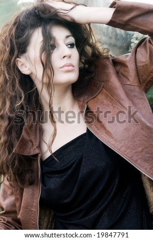 Woman with leather jacket