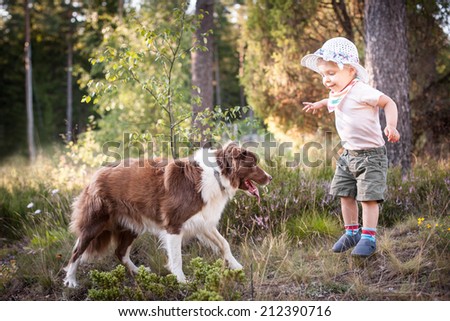 Little girl with large dog