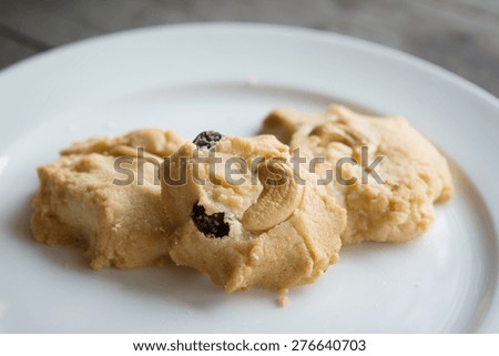 Oatmeal and Cashew Cookie on white plate