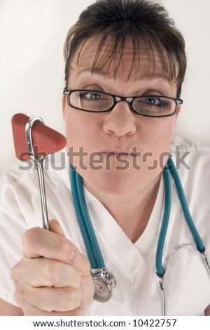 Nurse holding a reflex hammer with a very serious look on her face.