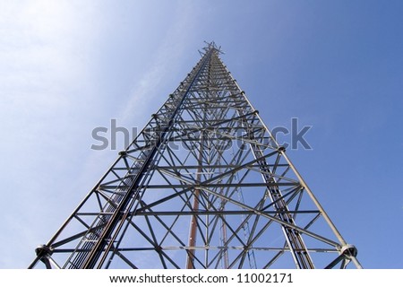 Cellular tower with clear blue sky