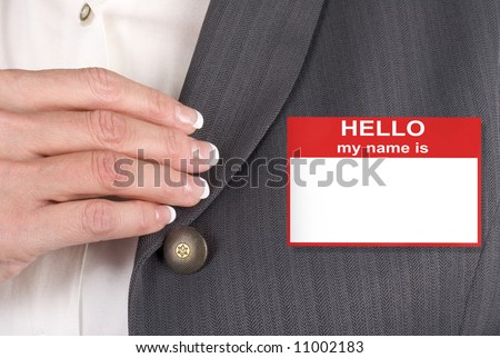 Female with name tag, hello my name is