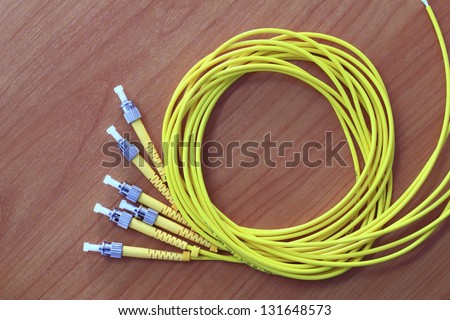 Telecommunication background.Twisted fiber optic single mode