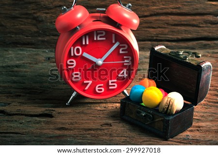 Clock on wood background - vintage