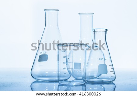 Group of laboratory flasks empty or filled
