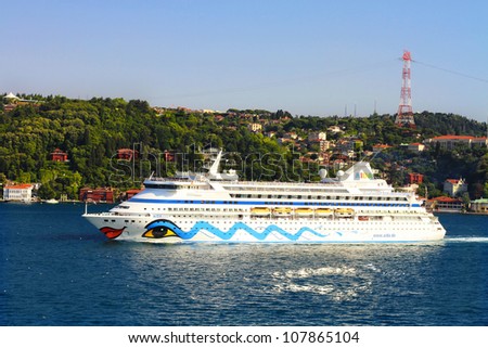 ISTANBUL - JULY 5: Passenger Ship AIDA Aura (IMO: 9221566, Italy) on July 5, 2012 in Istanbul. A 203 mt long, 28 mt width vessel, launched into the sea in 2003 and has a capacity of 1,300 passengers.