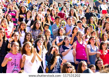 ISTANBUL - APRIL 22: Singer Atiye performs for the children during National Sovereignty and Children Day on April 22, 2012 in Istanbul. Children's Festival was first celebrated in Turkey on 1920.