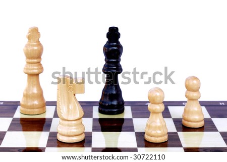 Defeat in chess, black king about to fall