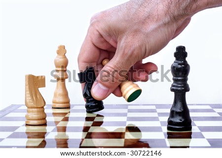 Chess player making his move