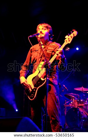 ISTANBUL - MAY 14: Band Mor ve Otesi performs live at Maltepe open air stage on May 14, 2010 in Istanbul, Turkey. Bass Burak Guven of the rock group plays.