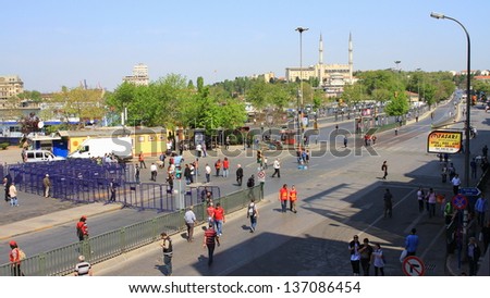 ISTANBUL - MAY 1: Many people can\'t take part in May Day march on May 1, 2013 in Istanbul. Police blocked all the ways to Taksim Square to prevent the activists from joining their mates. RIHTIM Street