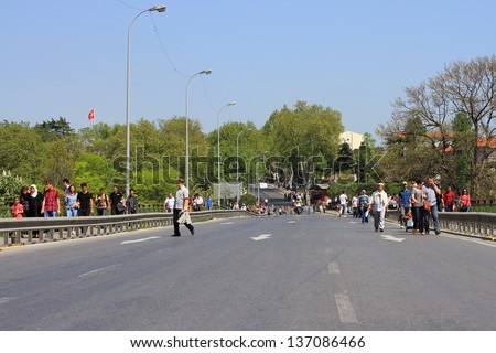 ISTANBUL - MAY 1: Many people can\'t take part in May Day march on May 1, 2013 in Istanbul. Police blocked all the ways to Taksim to prevent the activists from joining their mates. Haydarpasa exit way