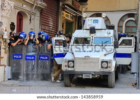 ISTANBUL - JUN 17: Five labor unions call 1-day nationwide strike over crackdown on June 17, 2013 in Istanbul, Turkey. Police team with full equipment wait a dead-end street.