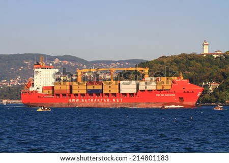 ISTANBUL - OCT 26, 2012: Container Ship AYSE NAZ BAYRAKTAR (IMO: 9397420, Turkey). 157 mt long, 25 mt width vessel, launched into the sea in 2008 and has a deadweight of 22,000 tons. Cargo Ship