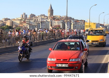 ISTANBUL - JULY 22: Traffic on Galata Bridge on July 22, 2011 in Istanbul. Due to increasing traffic & air pollution, Istanbul became one of most polluted city also planned for return of tram.