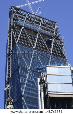 LONDON, UK - AUG 1: Leadenhall Building in construction on August 1, 2013, in London, UK. Roger Stirk Harbour + Partners (Richard Rogers) designed building (the Cheesegrater) completion due mid 2014.