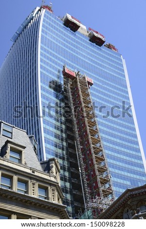 LONDON, UK - AUG 1: 20 Fenchurch Street in construction on August 1, 2013, in London, UK. Rafael Vinoly designed building (the Walkie-Talkie) completion due April 2014 with Markel and Kiln as tenants.