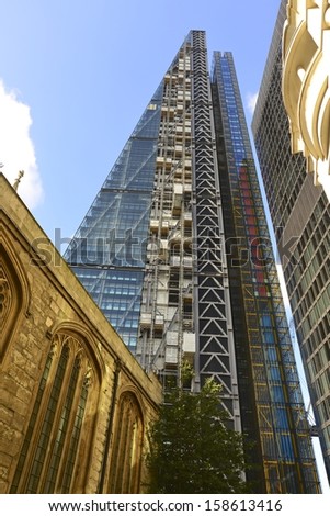 LONDON, UK - OCT 8: Leadenhall Building in construction on October 8, 2013, in London, UK. Roger Stirk Harbour + Partners (Richard Rogers) designed building (the Cheesegrater) completion due mid 2014.