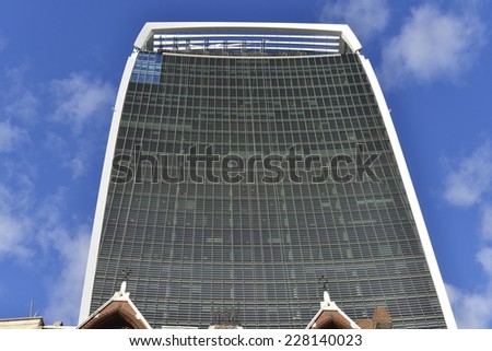 LONDON, UK - OCT 25: 20 Fenchurch Street in construction on October 25, 2014, in London, UK. Rafael Vinoly designed building (the Walkie-Talkie). New screens added to South face to cut glare on street