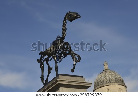 LONDON, UK - MAR 6: Gift Horse the new Forth Plinth sculpture in Trafalgar Square on March 6, 2015, in London, UK. By German born artist Hans Haacke and seen in front of The National Gallery.