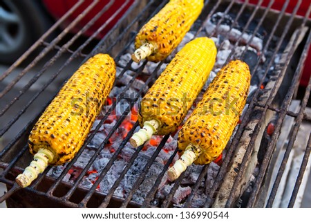 Grilled corn./3-4 vegetables grilled corn on the hot stove.