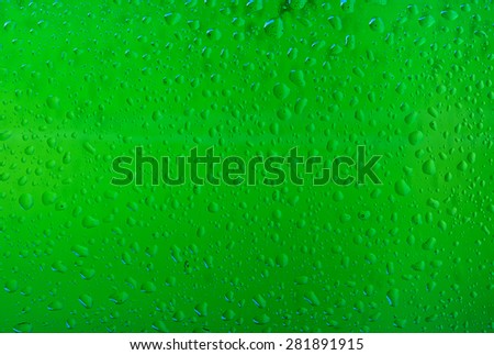 Texture water drops on the bottle of beer. Beer background