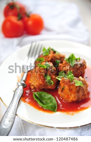 meat balls with basil, tomatoes and feta cheese