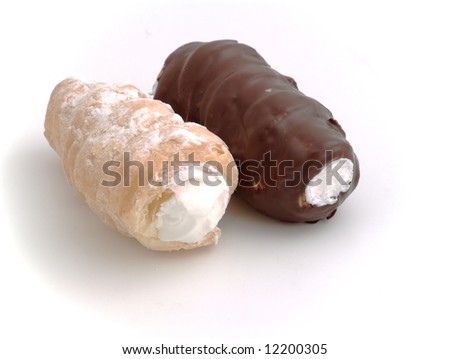 wafer rolls filled with meringue isolated on the white background