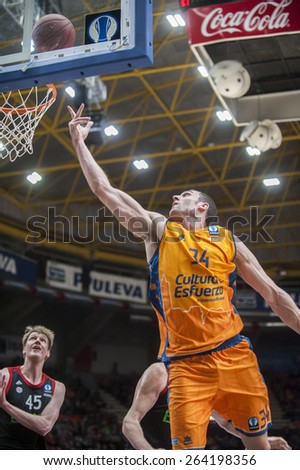 VALENCIA, SPAIN - MARCH 5: Pablo Aguilar and Jan Jagla during EURO CUP match between Valencia Basket Club and Bayern Munich at Fonteta Stadium on March 5, 2015 in Valencia, Spain