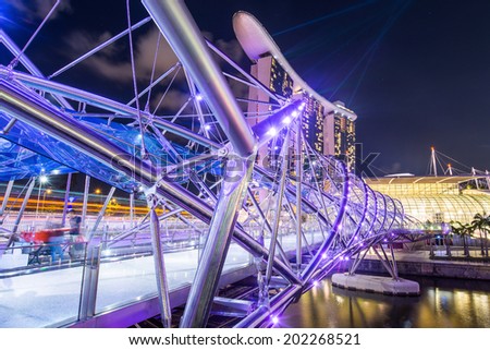 SINGAPORE -May 11: Wonderful laser show at the Marina Bay waterfront in Singapore. Marina Bay Sands Hotel dominates the skyline at Marina Bay on may 11, 2014.