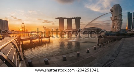 SINGAPORE -May 11: Wonderful sunrise at the Marina Bay waterfront in Singapore. Marina Bay Sands Hotel dominates the skyline at Marina Bay on may 11, 2014.