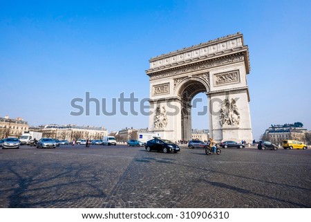 PARIS - MARCH 20: view of the Arc de Triomphe and traffic jam on March 20, 2015 in Paris, France. The Arc de Triomphe is one of the main attractions of Paris with more than 15 million visitors a year.