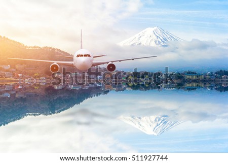 Airplane frying over the Snow Mountain Fuji background