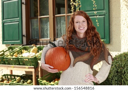 Woman with pumpkin country side Attractive woman with pumpkin