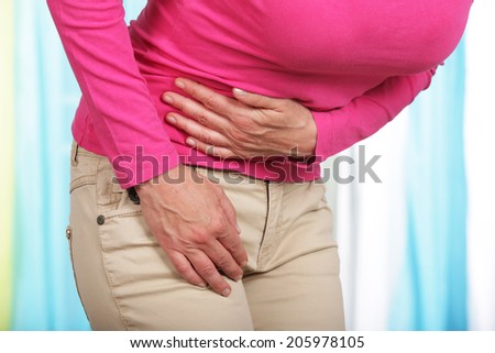 Woman with severe stomach pain