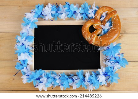 Black board with blue and white  bavarian girland