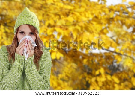 Woman with handkerchief and fall background
