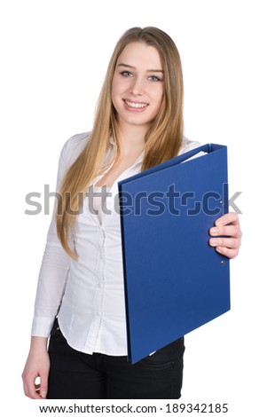 Cut out image of a young smiling woman who is handing over a blue file. Face is in focus, file is blurred.