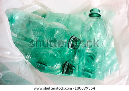 green plastic bottles sorted for recycling