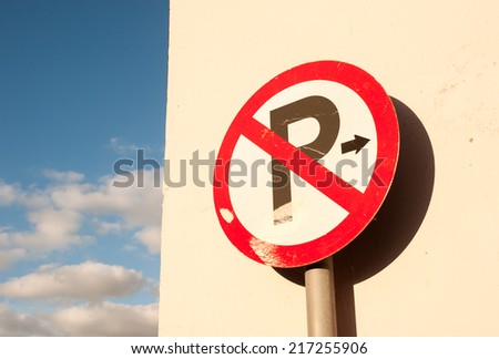 no parking sign wall