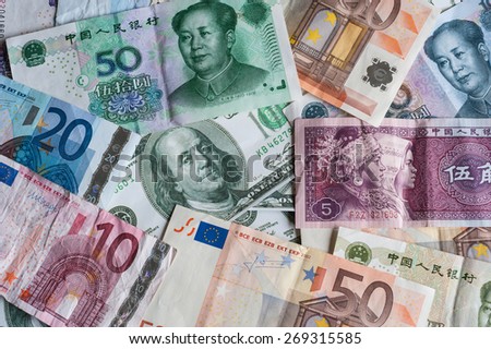 Chinese, American and European paper currencies background