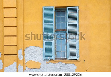 window shutters on of old building in the south of France